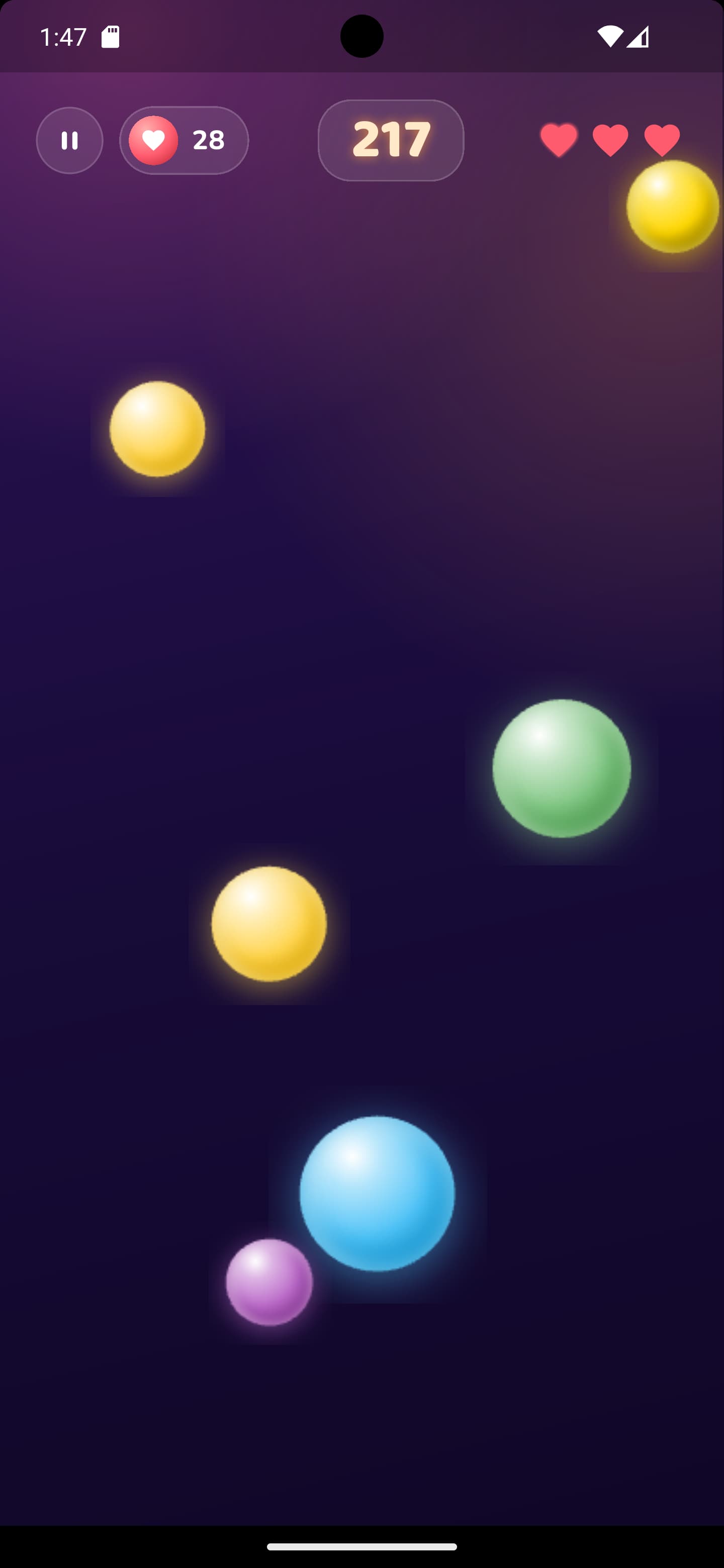 Coloured bubbles drifting upward, with score and lives in the HUD